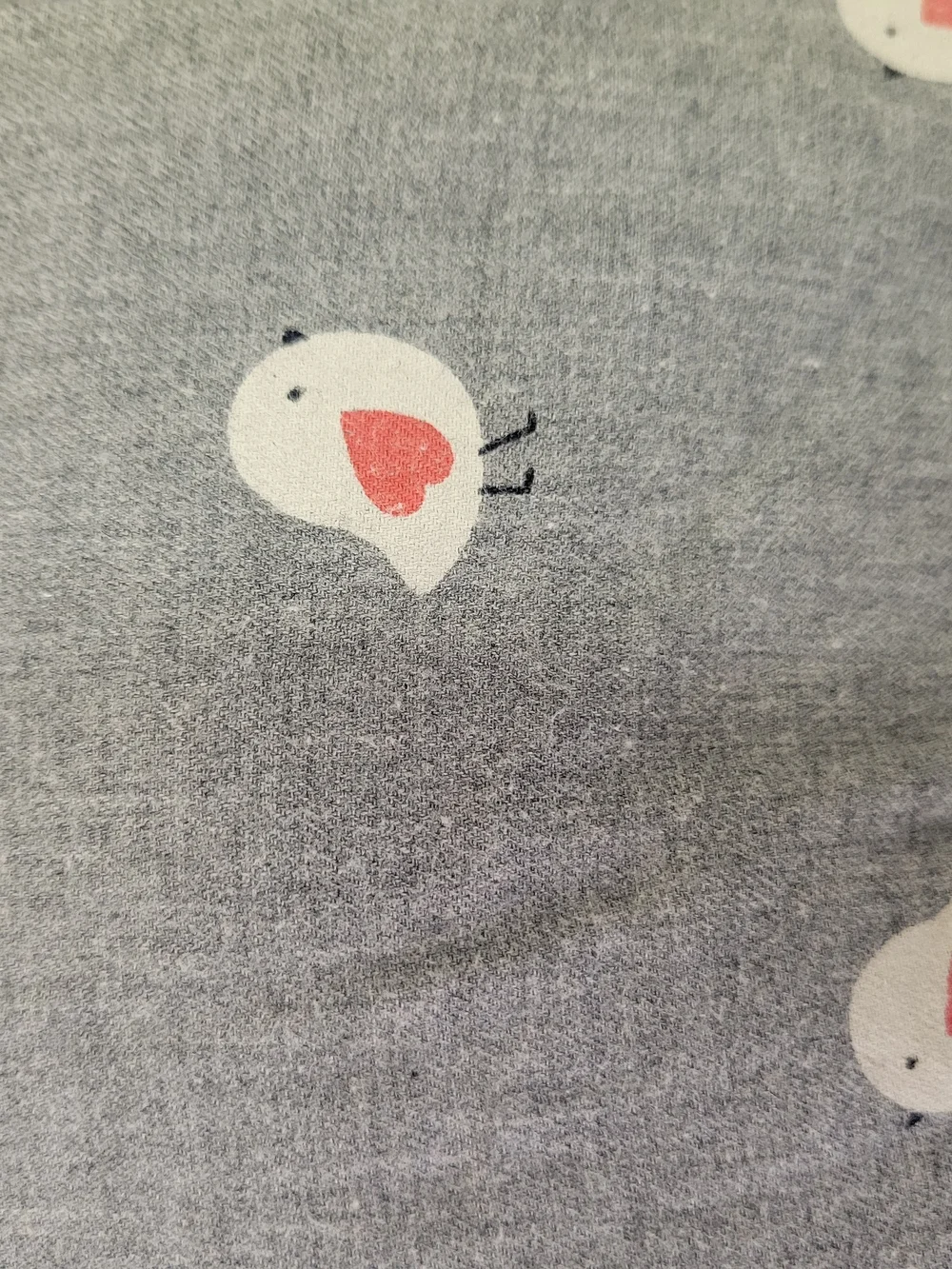 Gray Jacadi Paris infant snowsuit featuring a red and white bird pattern 12m